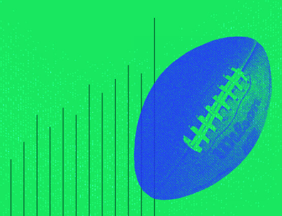 Blue football on green background